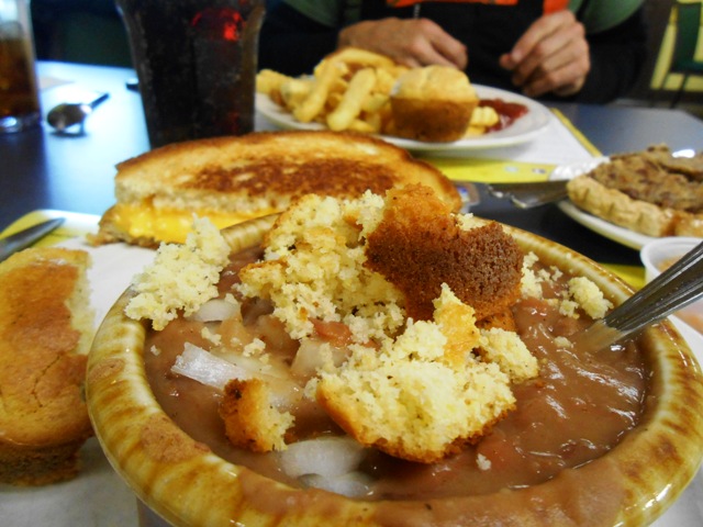 You can't go wrong with pinto beans and cornbread. Don't forget the onion and chow chow!